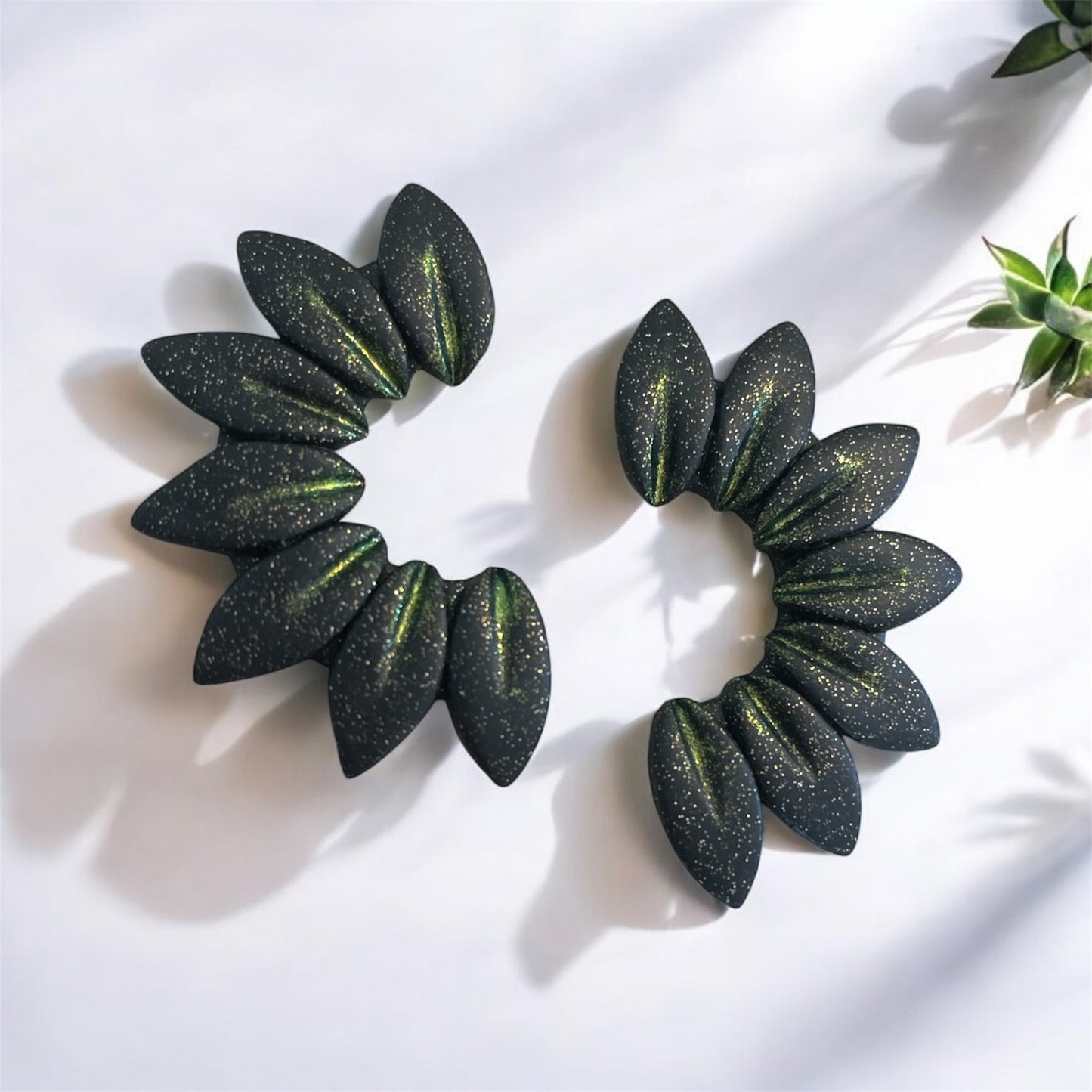 Daisy Crown statement earrings in black